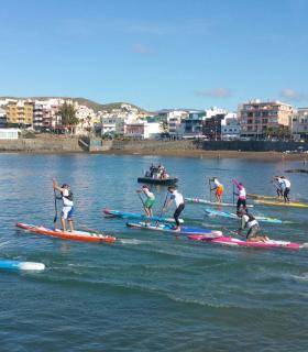 Martino Rogai y Susanne Lier, primeros vencedores del Campeonato de Paddle Surf de Mogán en la modalidad Downwind Race. · foto 2