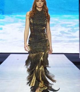 La moda baño y para vestir a la mujer deslumbró en las las pasarelas de la Feria Internacional de la Moda de Tenerife. · foto 7