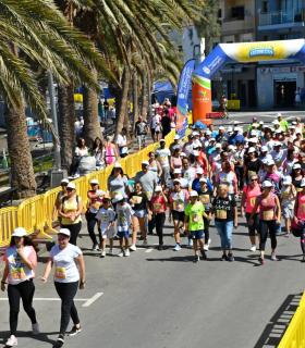 Carlos Sirwani y Juani Espino ganan la distancia absoluta de 10 kilómetros de la Carrera Popular de Arguineguín 2018 · foto 1