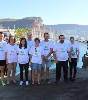 Un centenar de voluntarios contribuyen a limpiar el fondo marino del Puerto de Mogán · foto 3